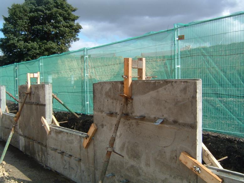 Panels being installed at track level.