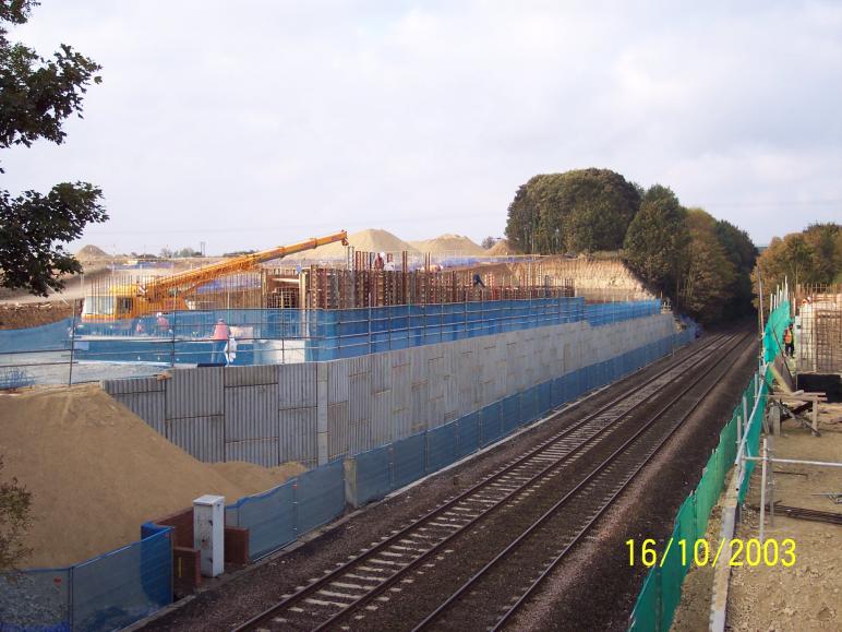 South Abutment progressing slightly behind the North side.