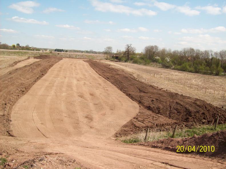 Topsoil strip on the southern side of the embankment.