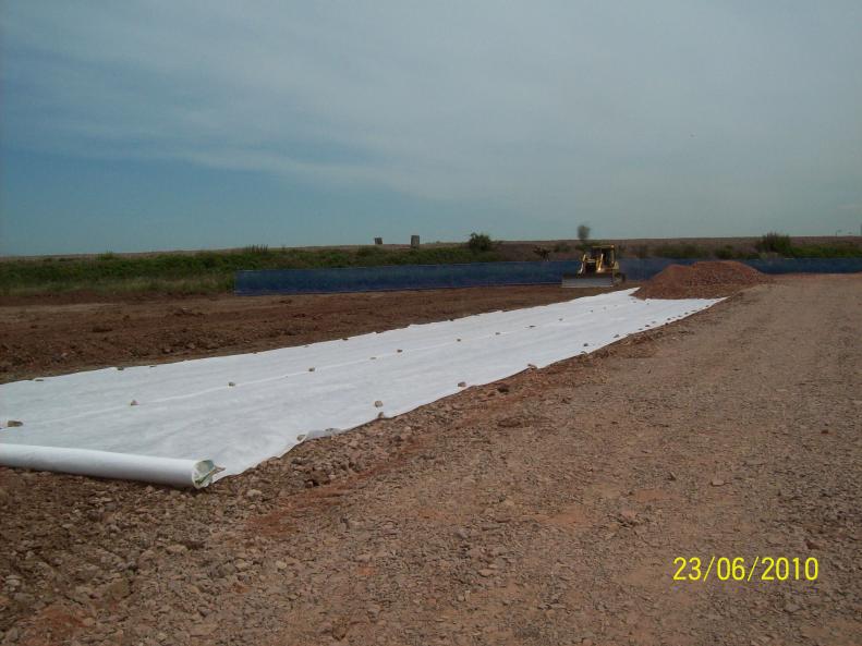 Geotextile and stone being placed in the site compound build area