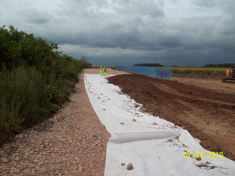 South Side -stone layer installed with geotextile and fill material being placed Class 2 