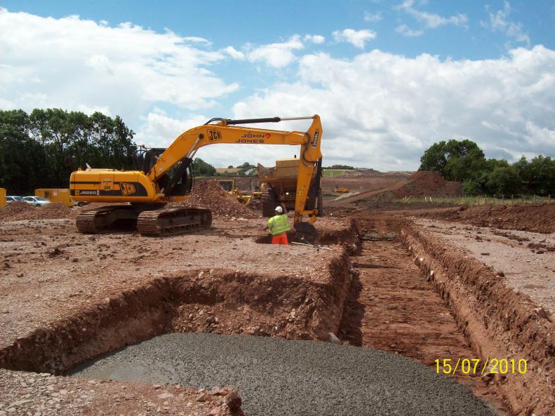 Temporary Casting beds being excavated by John Jones with MRC place the concrete.