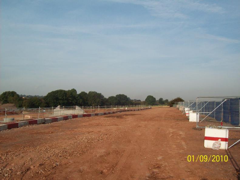 South piling embankment - fences, stop blocks stone rolled flat.