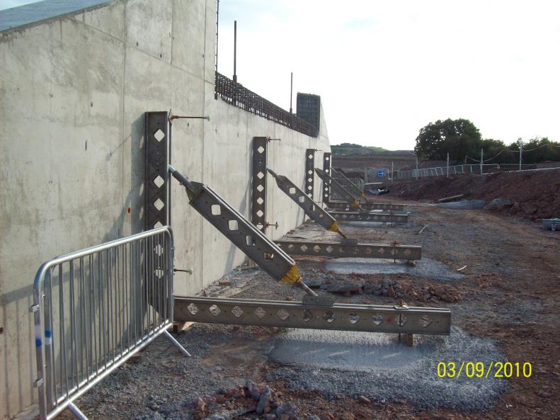 Abutments fitted out with temporary works to prevent them being kncked over. 