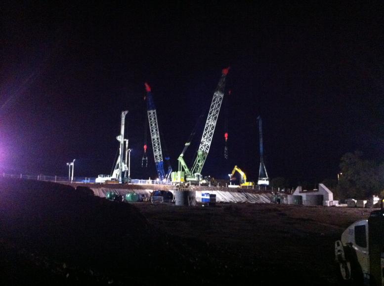 View of the piling at night from the compound