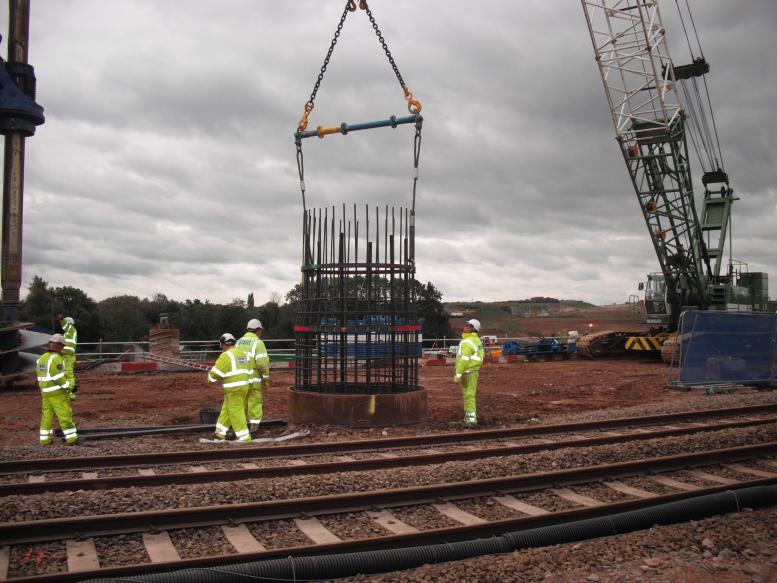 Crane lifting in the bottom section of reinforcement cage.