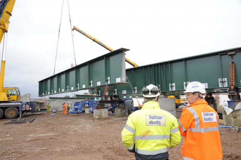 Bridge Girders being erected Rob Steven - Hoare and David Millar looking on 