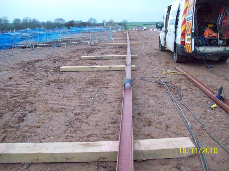 Steel channel being installed to carry cables in Phase II