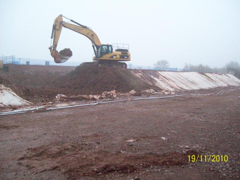 John Jones excavating out the southern piling Platform.