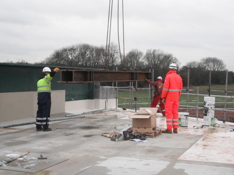 Mammoet lifting the Carrier beams into place on the deck.