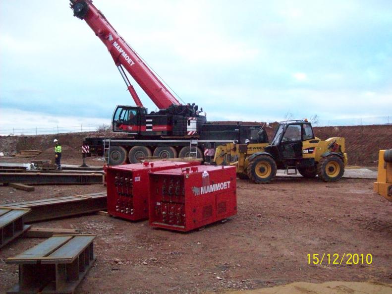 Mammoet crane on site - beams and power packs being laid out on site.