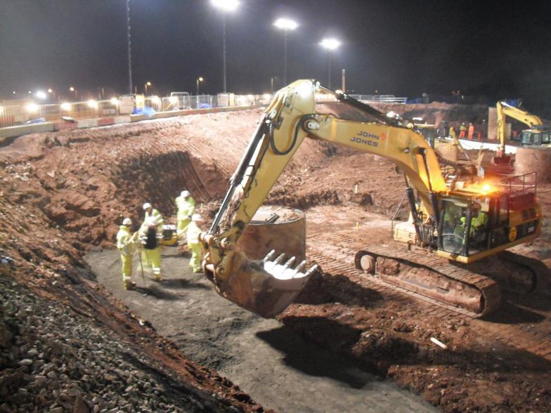 Excavator being used to the mass fill concrete.