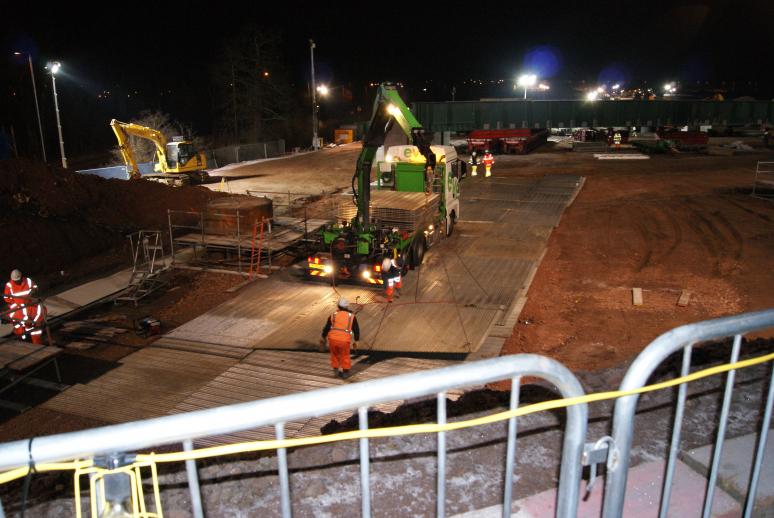 Eve trackway installing track panels to the East drive path.