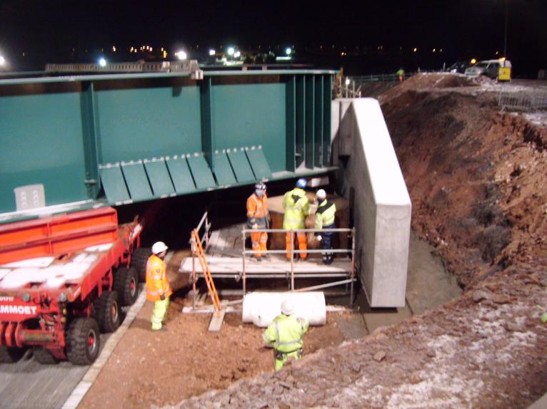 Bridge moved into place and being lined up for landing.