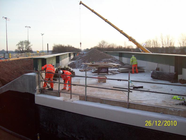 Waterseal working on the deck to fit out the bridge joints. Ainscough lifting out the temporary works.