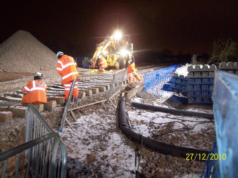 RRV installing new sleepers on the down road.