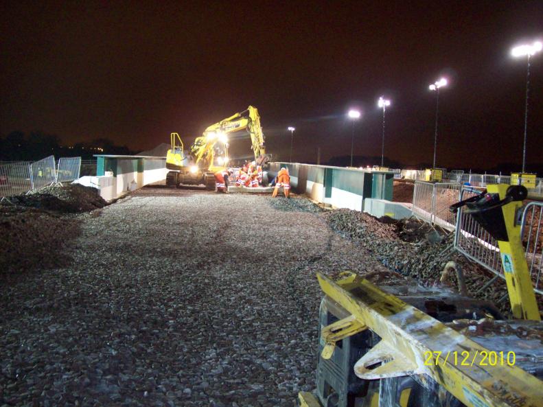 RRV installing the sleepers over the bridge.