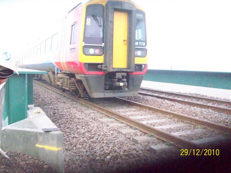 Trains running over the bridge under a TSR.