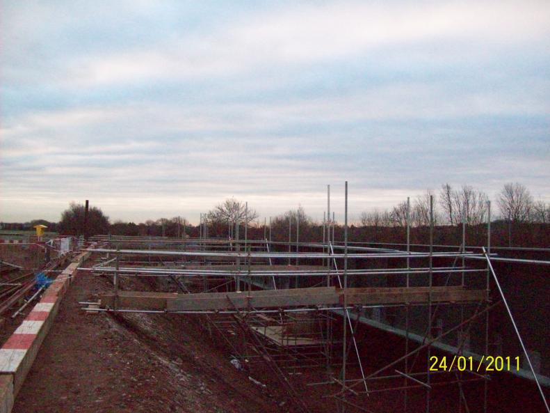 Scaffold Access ways used to move the cables from the embankment onto the bridge.