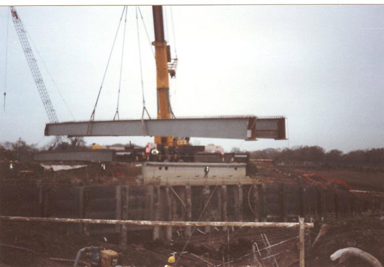 Crane lifting bridge girders