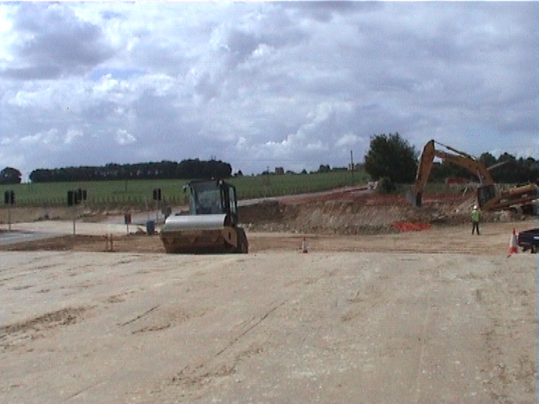 Old road being excavated and abutments formed