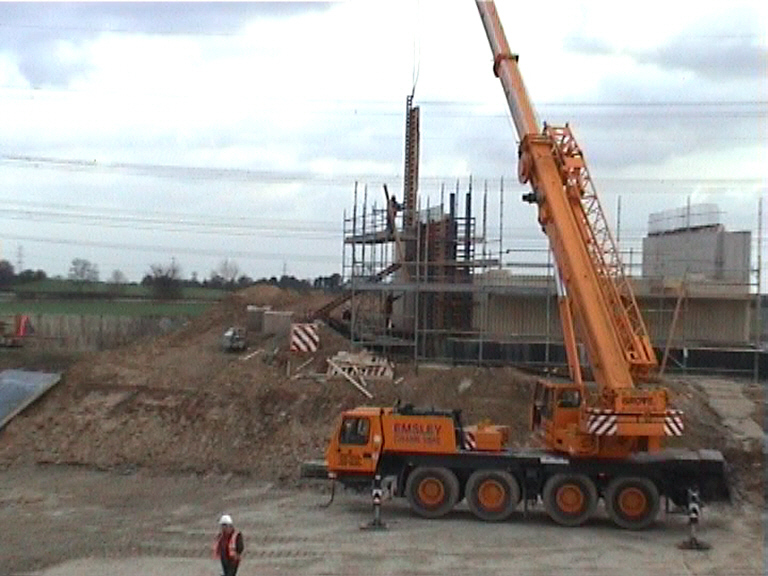 Formwork being removed from wingwall.