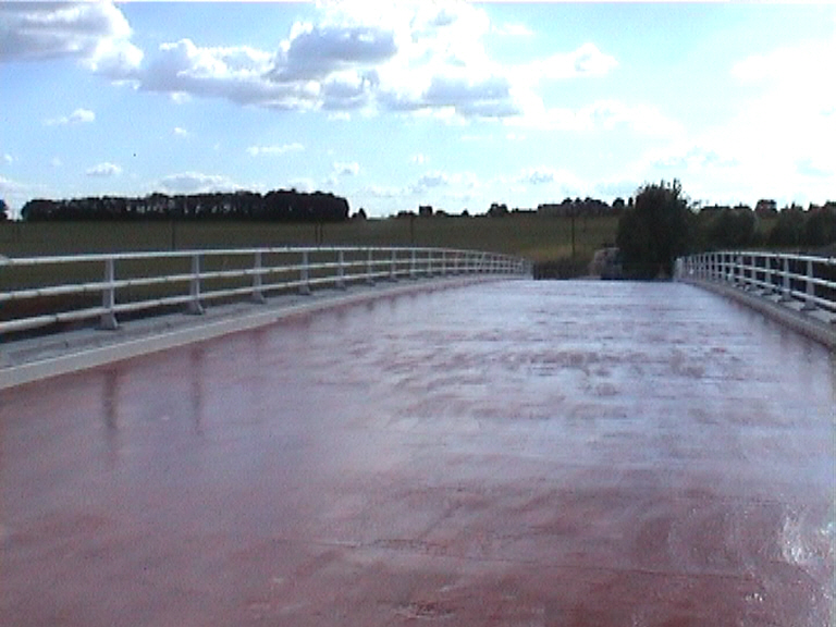 Bridge deck waterproofed and tack coat applied