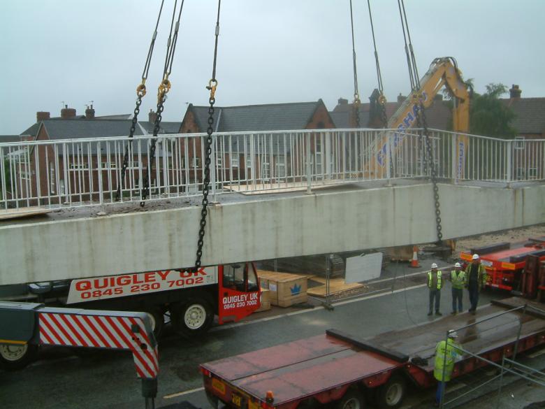 East span being lifted out