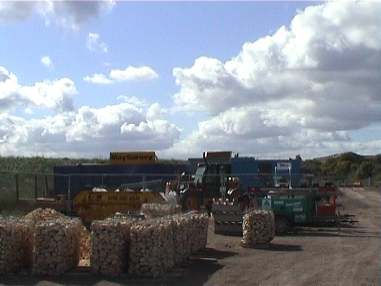 Gabion baskets being made up ready for lifting into place in the possession.