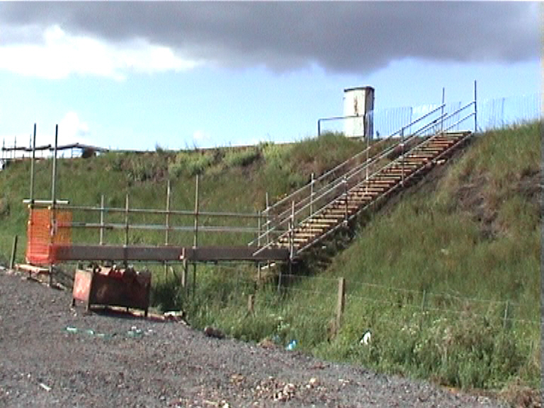 SYS Ltd installing an access up to the embankment as track access.