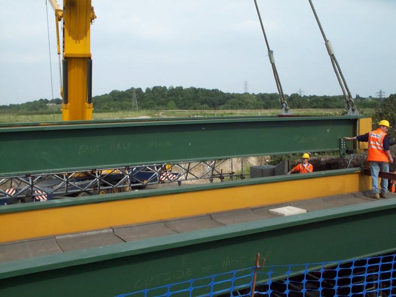 2nd bridge deck being lifted into place - David Millar on the Deck.