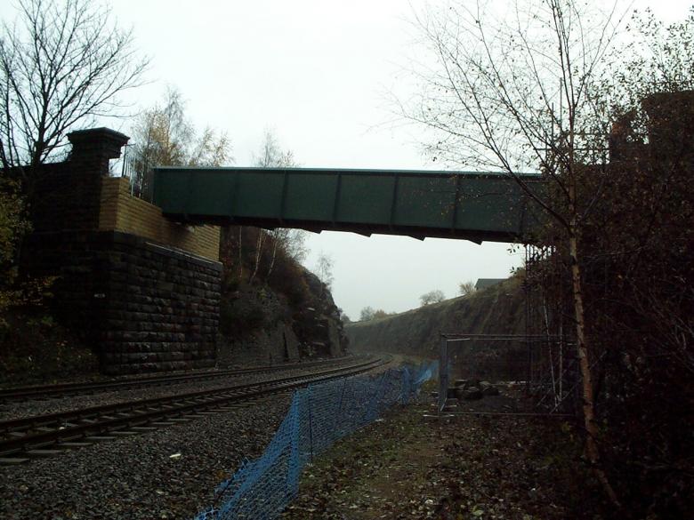 Bridge Deck installed and Retaining wall being constructed.