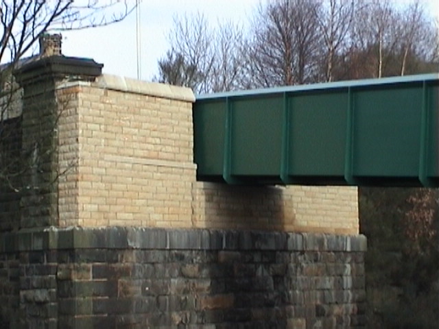 North Abutment stone facing completed.