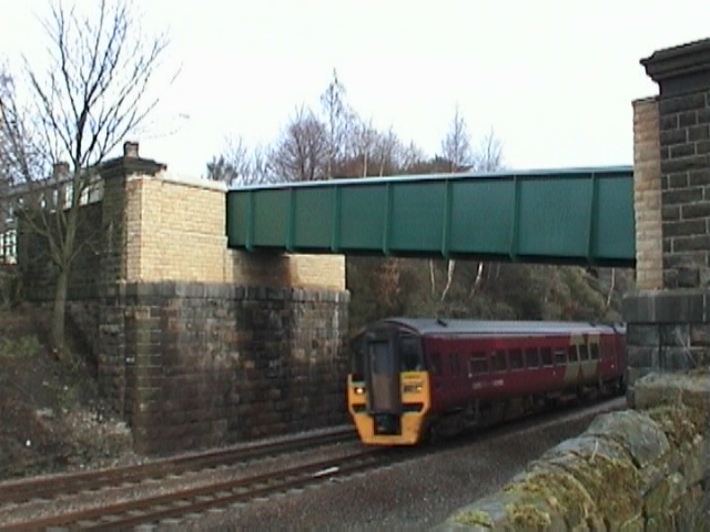 Manchester Airport Express passing under the new Bridge.