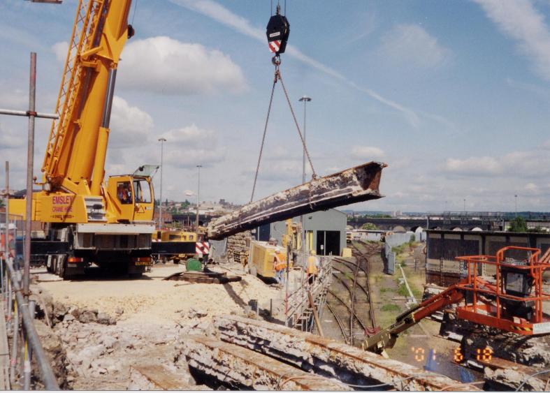 Crane lifting internal beams.