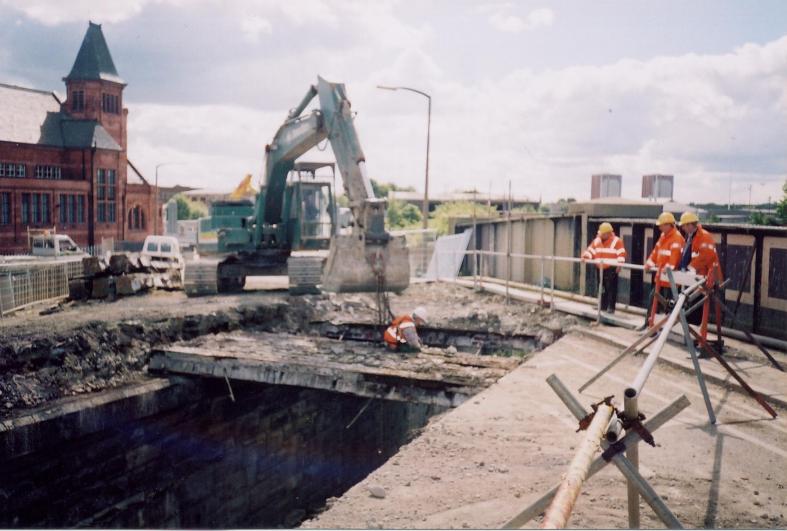 East Abutment beams being removed by excavator