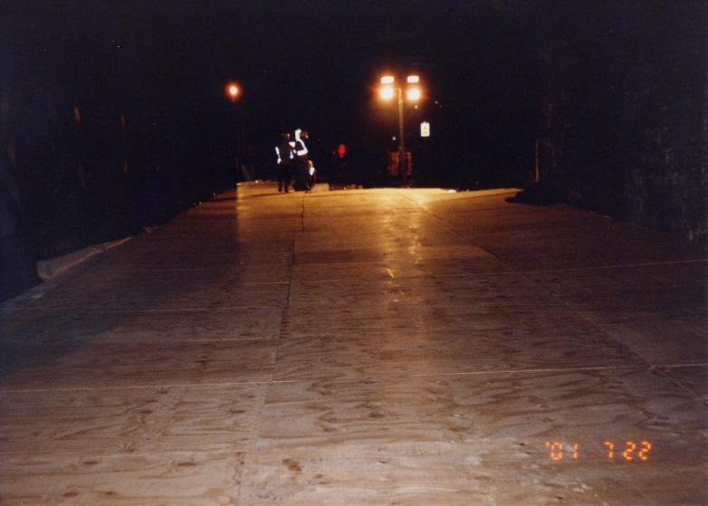 Crash Deck being installed under the bridge to be demolished 