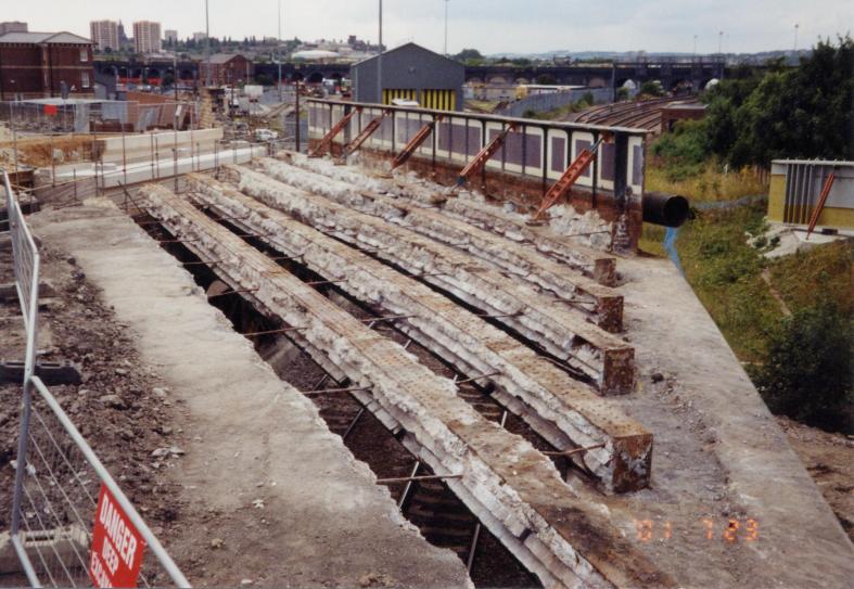 Arches  broken out with the girders ready to be removed.