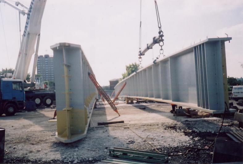 Crane offloading the beams on site ready for welding and painting.