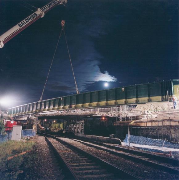 Cenral Girder being lifted into place. 
