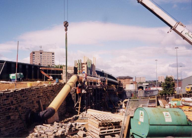 Gas Main being installed on the North side of the Bridge.