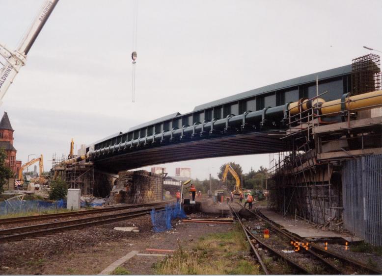 New Gas main Live on the North Girder + old bridge girders removed.