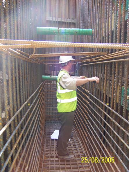 South Abutment steel reinforcement being inspected.