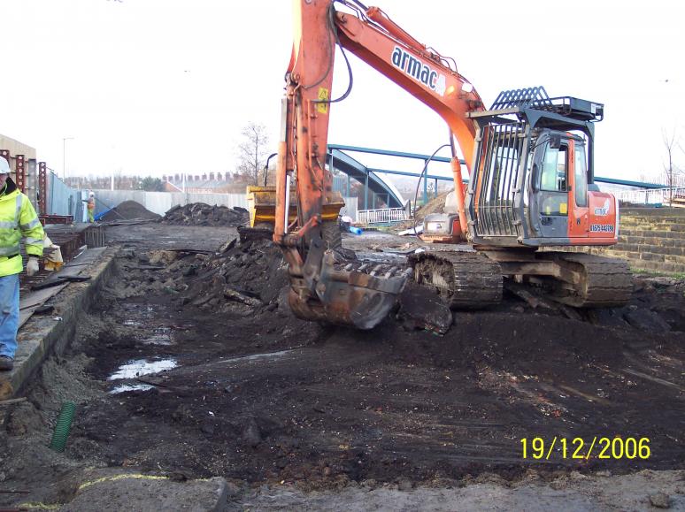 Armac clearing the deck surfacing and services.