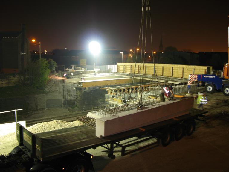 Concrete Parapet units being connected up for lifting.