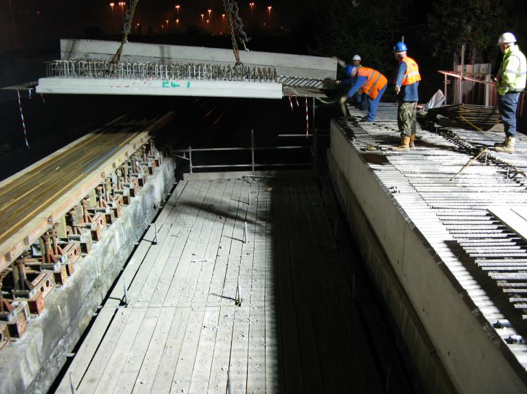 Parapet units being installed onto the temporary works.