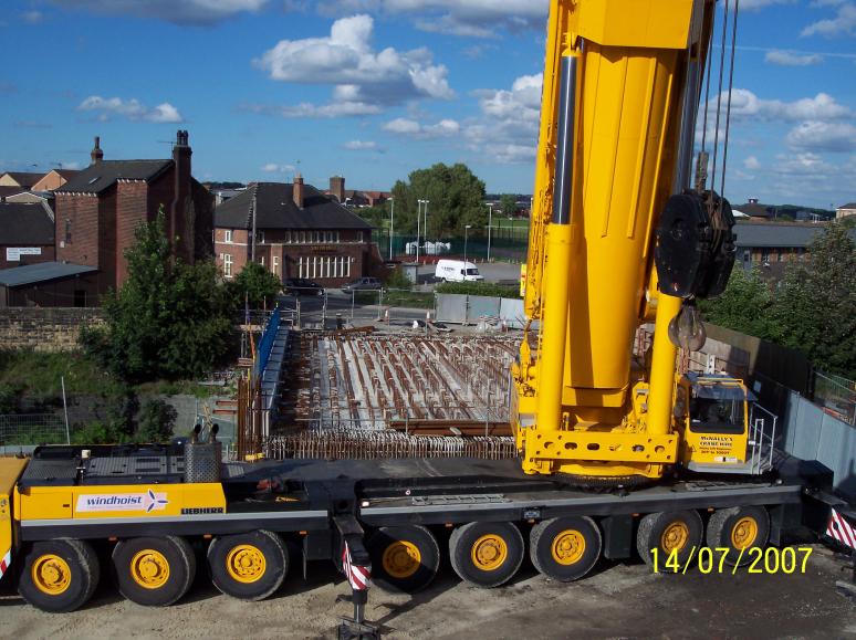 500T Crane lifting out the defective edge parapet unit and lifting in the replacement unit.