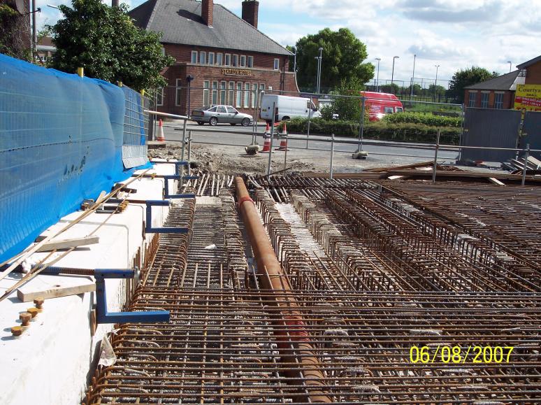 Steel duct installed on the deck to carry the new watermain. 