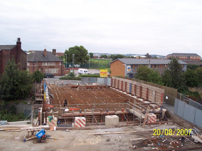 Steel nearly all fixed on the deck with formwork progressing a the abutments.