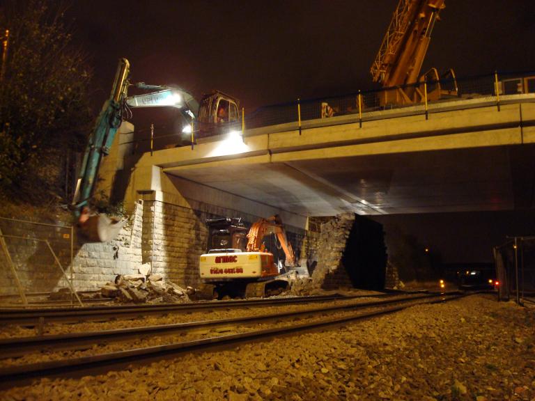 North Pier being broken down - material being fed to the excavator on the deck removing the material to road level.